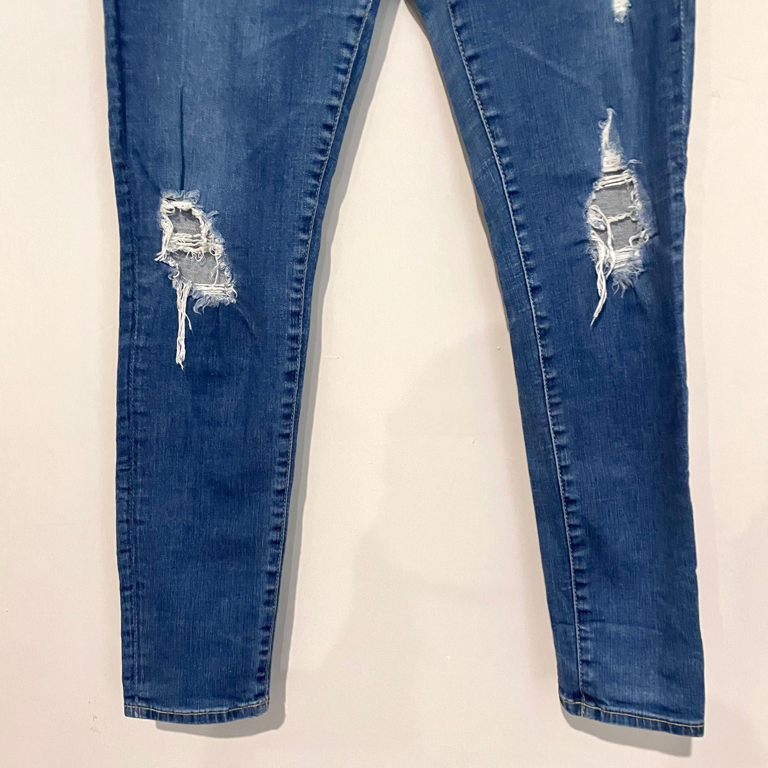 Distressed Super Skinny Jeans