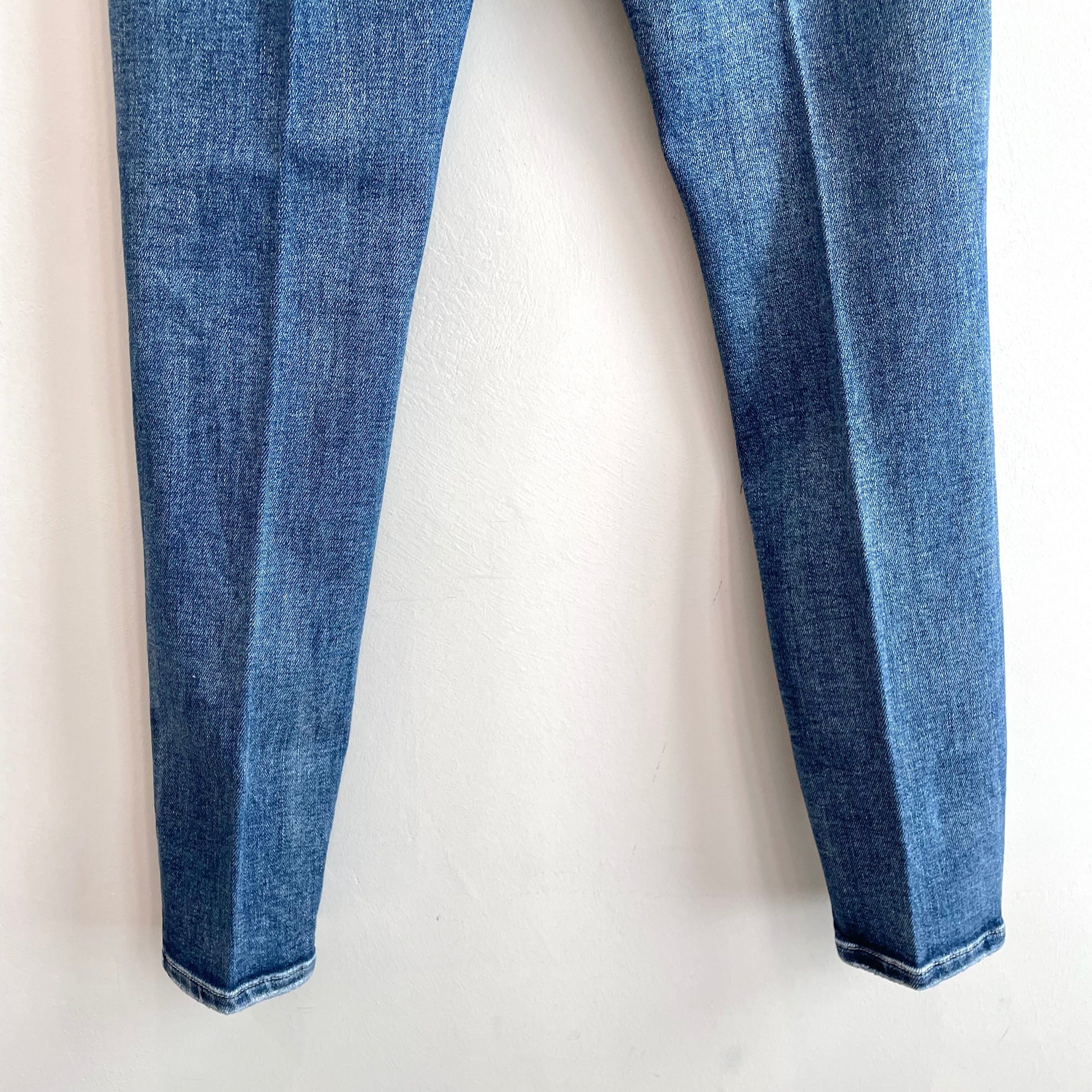 Distressed Mid Rise Skinny Jeans