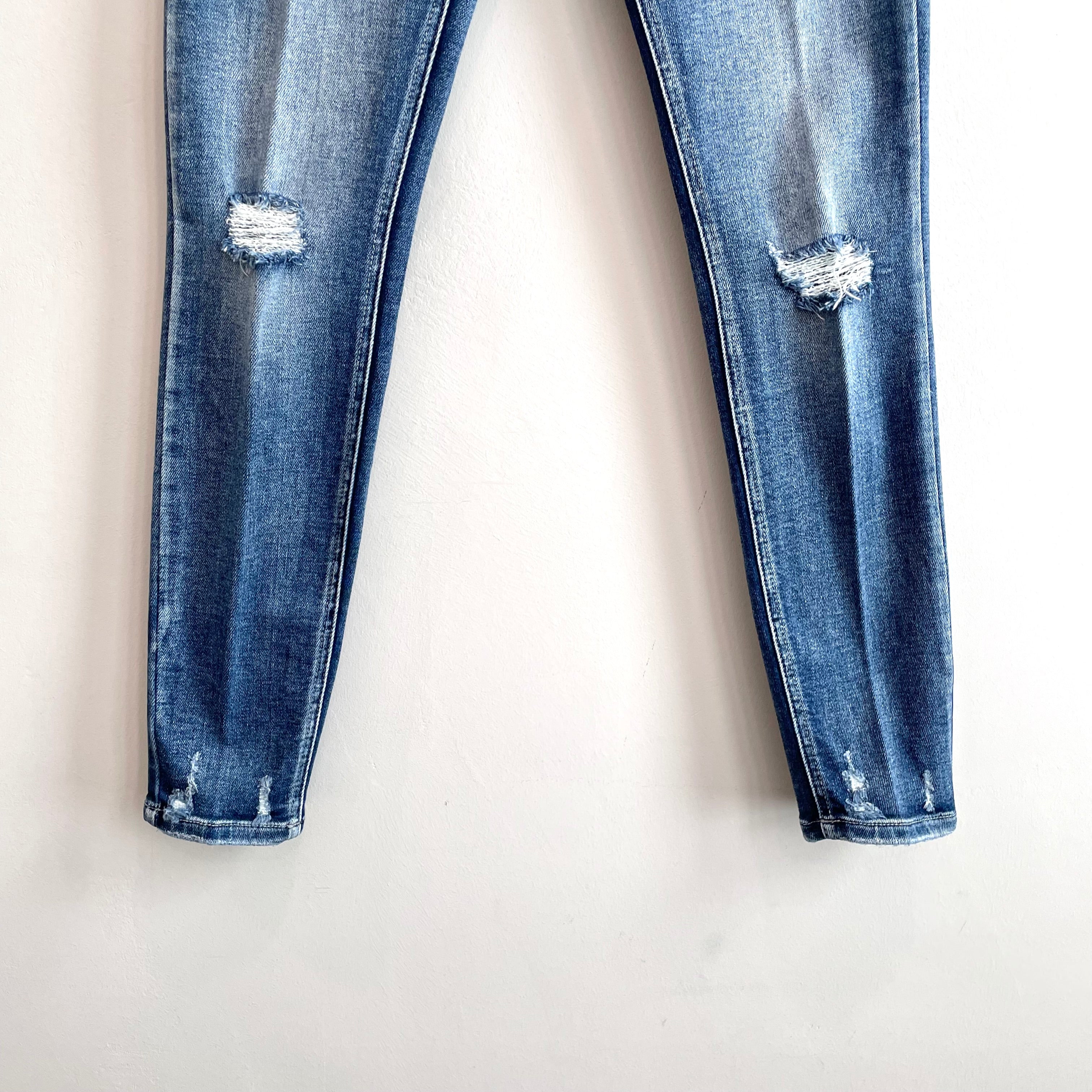 Distressed Mid Rise Skinny Jeans