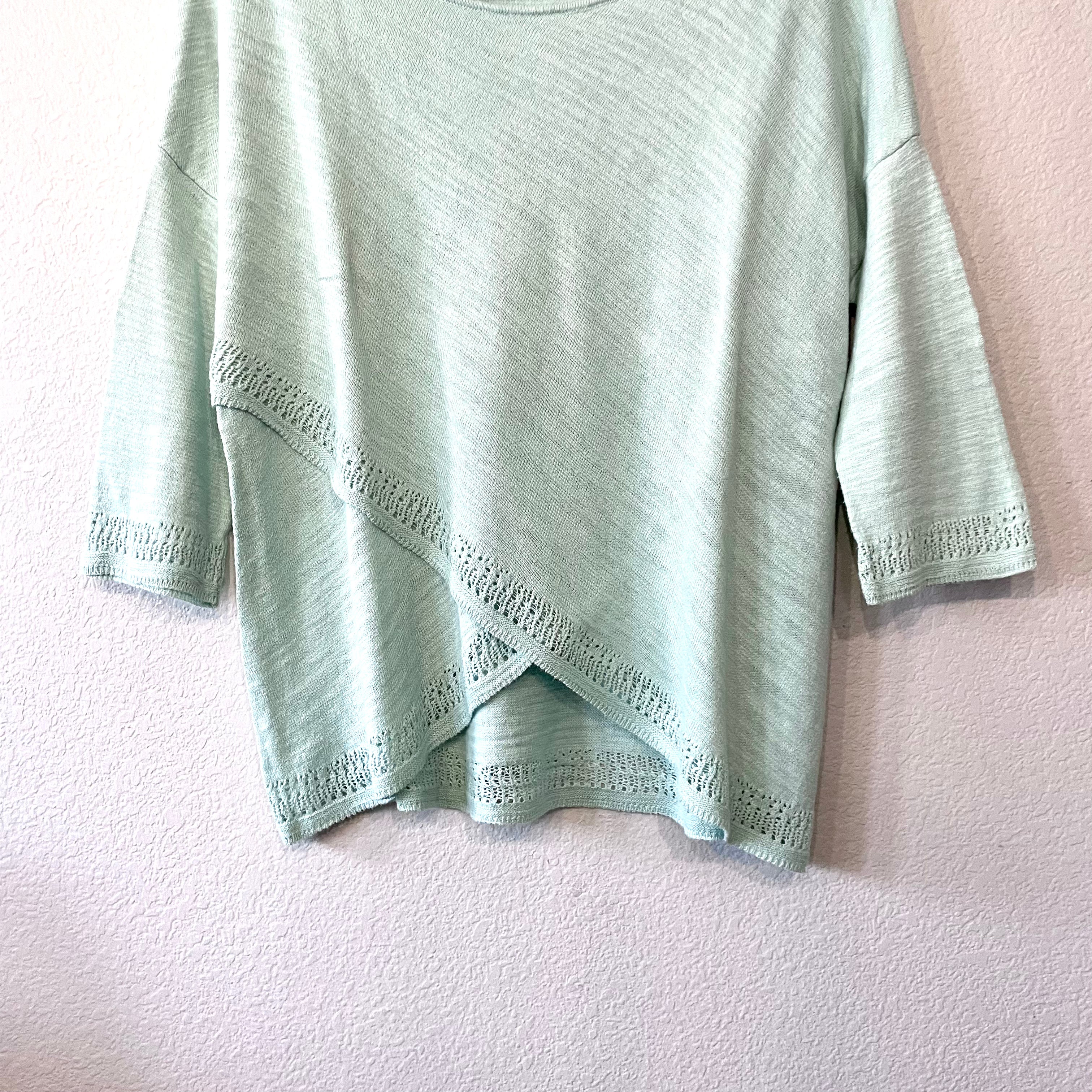 Pointelle Cross Front Hem Sweater