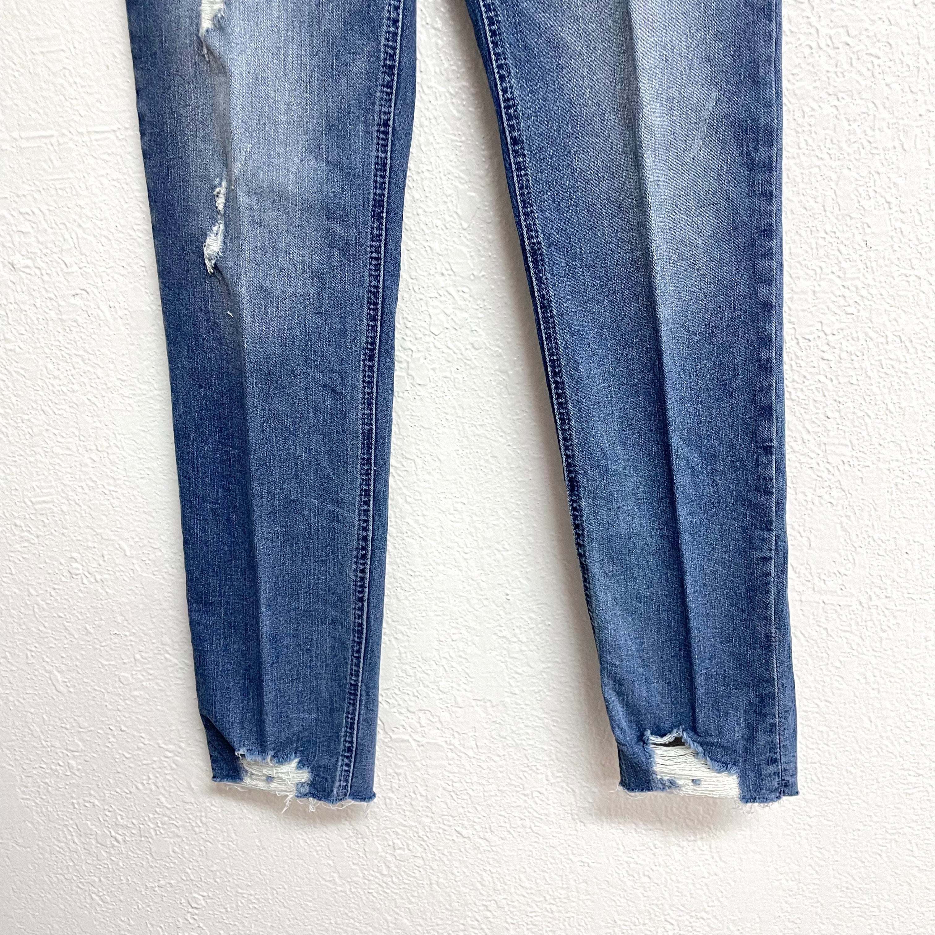 Distressed Slim Jeans