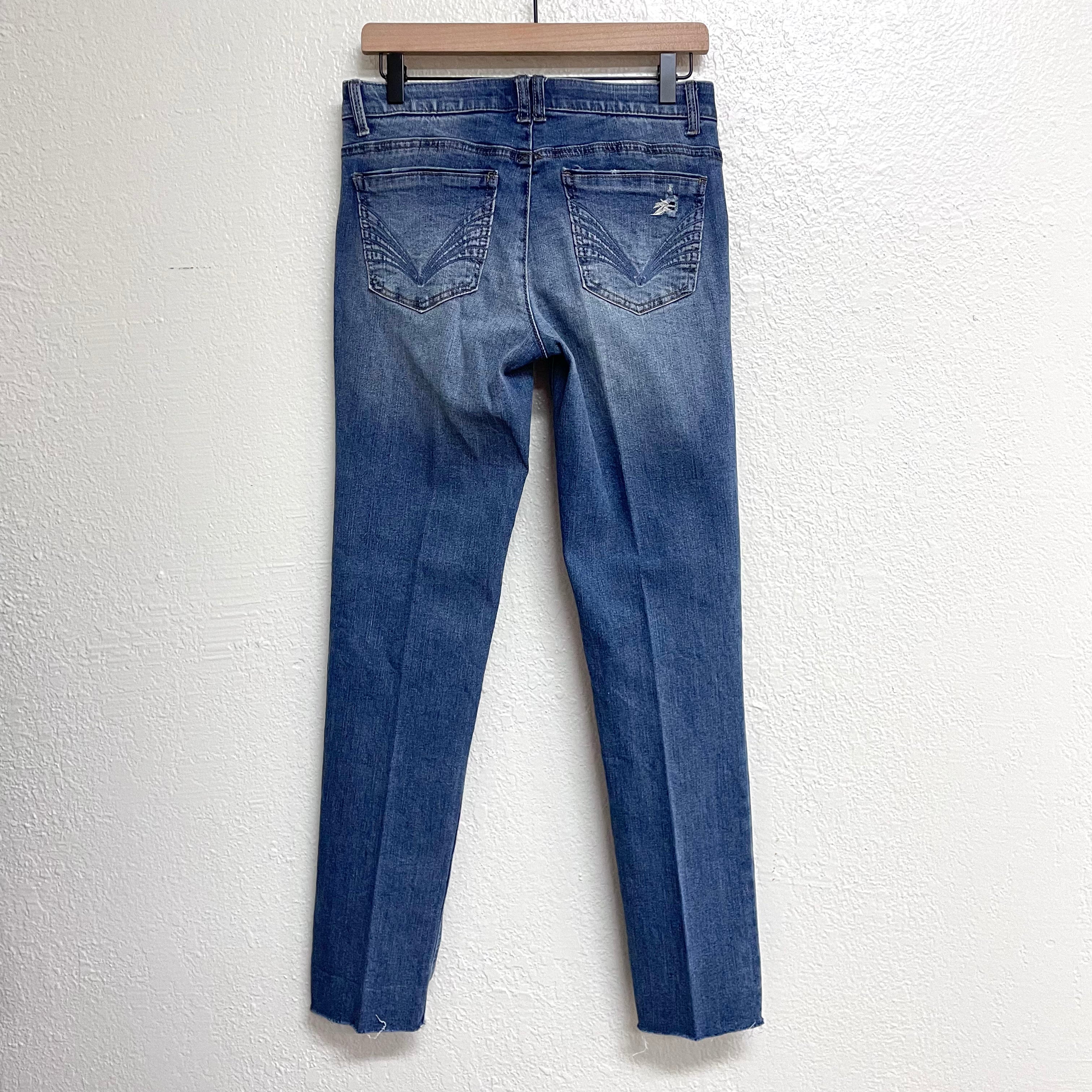 Distressed Slim Jeans