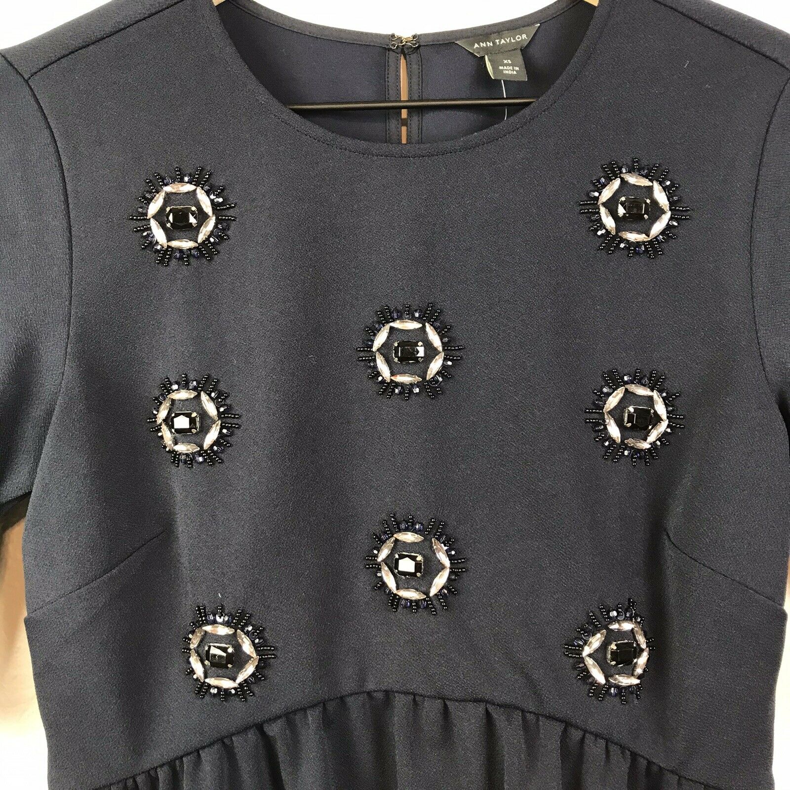 Beaded Jewel Peplum Blouse